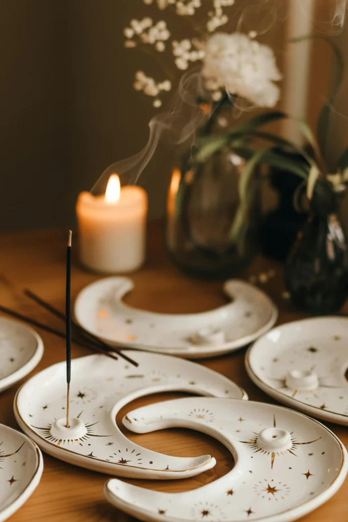 handmade incense and candles displayed on table