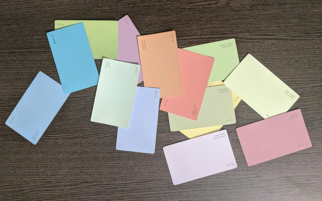 colorful affirmation cards spread on desk