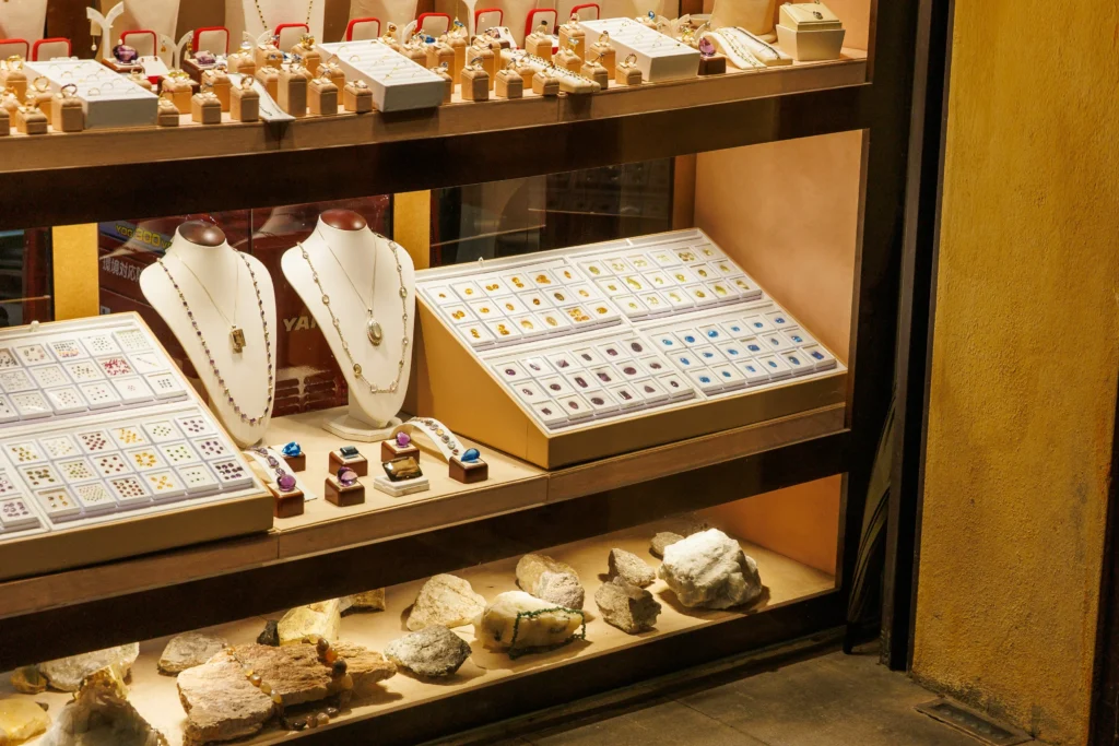 crystal shop table display with gemstones