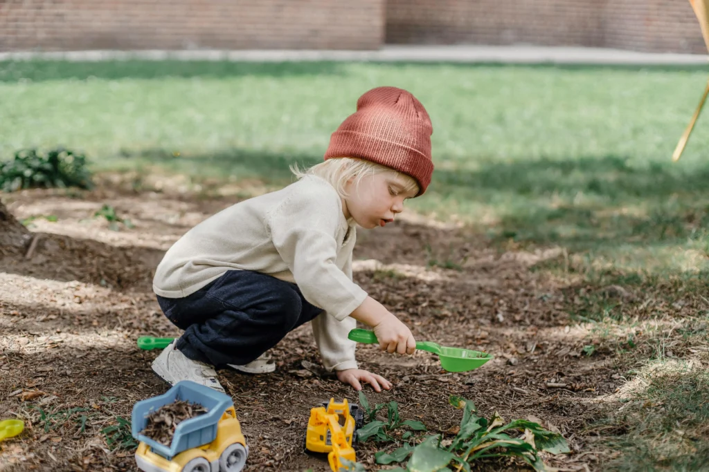 Kids playing with backyard toys